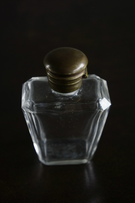 brass cap perfume bottle