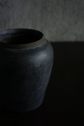 clay pot with brass rim